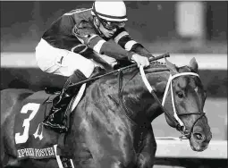  ?? CHURCHILL DOWNS/COADY PHOTOGRAPH­Y ?? Gun Runner led throughout the Stephen Foster Handicap, winning by seven lengths and earning a BC Classic berth.