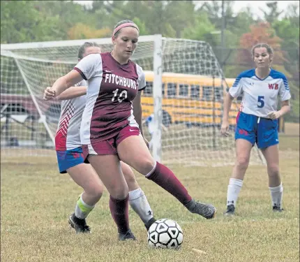  ?? JOHN LOVE / SENTINEL & ENTERPRISE FILE ?? Fitchburg High’s Elle Scott controls the ball during a game last year against West Boylston.