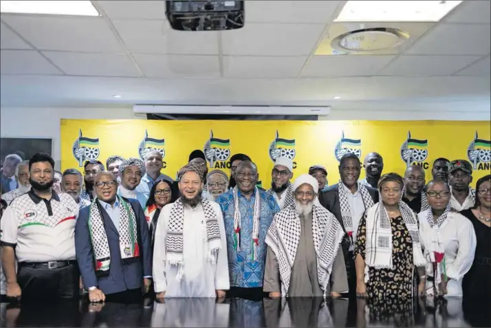  ?? Photo: Roberta Ciuccio/afp ?? Integrity: President Cyril Ramaphosa (fourth left), Moulana Ebrahim Bham (third left), Moulana Abdul Khaliq Allie (fifth left) and other members of the United Ulama Council of South Africa. The council has backed the government’s referral of Israel to the Internatio­nal Court of Justice for genocide in Gaza.