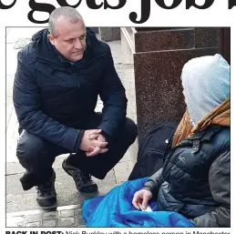  ??  ?? BACK IN POST: Nick Buckley with a homeless person in Manchester