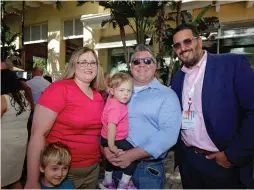  ??  ?? Child Artist Ellie O’Neal and family with Armando Llechu at the Southwest Florida Wine & Food Fest 2020