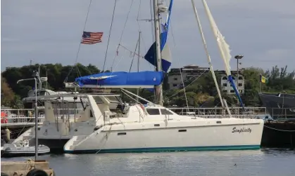  ?? Photograph: Kenton X Chance/AP ?? The yacht Simplicity, which officials say was hijacked by three escaped prisoners with two people onboard, is docked at Calliaqua, St Vincent and the Grenadines.