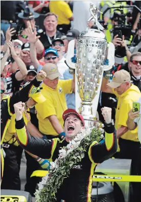  ?? MICHAEL CONROY
THE ASSOCIATED PRESS ?? Simon Pagenaud of France celebrates after winning the Indianapol­is 500 on Sunday. “I never expected to be in this position and I certainly am grateful,” he said.