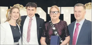  ?? ?? Bailey Lane, Ballylande­rs, pictured with his proud parents Marguerite and Tom Lane and former president Mary McAleese, at the recent Law Summit held in Rochestown Park Hotel, Cork.