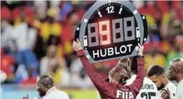  ?? Picture: CARL RECINE ?? FULL VALUE: Fourth official Stephanie Frappart’s board shows nine minutes added on during a World Cup soccer match in Qatar.