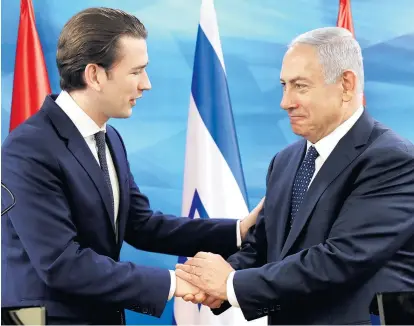  ??  ?? Der österreich­ische Kanzler gibt sich betont Israel-freundlich: ein Handshake zwischen Sebastian Kurz und Premiermin­ister Benjamin Netanjahu im Juni 2018 in Jerusalem.