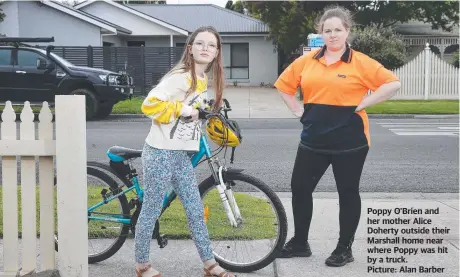  ?? ?? Poppy O'Brien and her mother Alice Doherty outside their Marshall home near where Poppy was hit by a truck.
Picture: Alan Barber