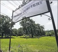  ?? Arkansas Democrat-Gazette/MITCHELL PE MASILUN ?? The marker noting the grounds of Thomas Cemetery in North Little Rock is seen Monday.