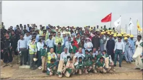  ??  ?? A group of young Pakistani visitors pose at the project site with the CMEC building team.