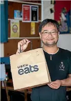  ?? DOMINICO ZAPATA/STUFF ?? UberEats delivers for 400 Auckland restaurant­s.