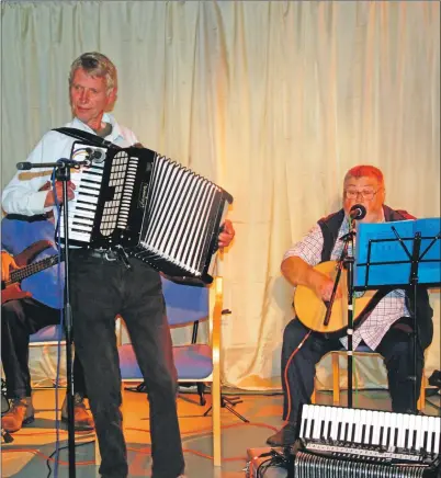  ??  ?? Dalriada Trio got the night going (left, 08_a29easyclu­b03) and regular performers Sanctuary, with whom David played, also entertaine­d. (08_a29easyclu­b01).