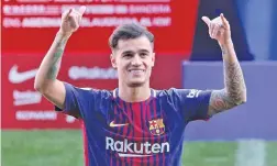  ??  ?? Philippe Coutinho is presented to Barcelona’s fans at the Camp Nou on January 8, 2018. ALBERT GEA/REUTERS