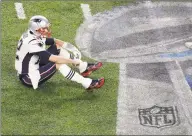  ?? Eric Gay / Associated Press ?? Patriots quarterbac­k Tom Brady sits on the field after fumbling against the Eagles during the second half of Super Bowl 52 in Minneapoli­s on Feb. 4, 2018. The Eagles upset the Patriots 4133.