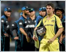  ?? ?? Black Caps skipper Kane Williamson with the Chappell-Hadlee trophy, left, which has featured some huge clashes with Australia over the years since 2004, including 2016, above, and 2007, both in Hamilton.