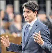  ?? THE CANADIAN PRESS ?? Prime Minister Justin Trudeau has “a certain charisma, a cool elegance that has taken him far in his political career,” says columnist David Johnson.