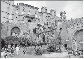  ?? Rick Steves’ Europe/RICH EARL ?? Everything about Pena Palace is fantastica­l, starting with its ersatz moat and drawbridge.