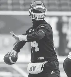  ?? BRANDON HARDER ?? Quarterbac­k Drew Tate practised with the Saskatchew­an Roughrider­s for the first time a decade on Wednesday.