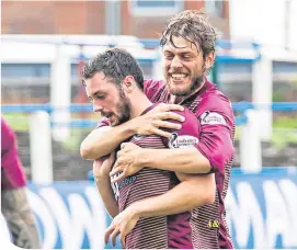  ??  ?? Tony Watt celebrates scoring his second goal, St Johnstone’s third