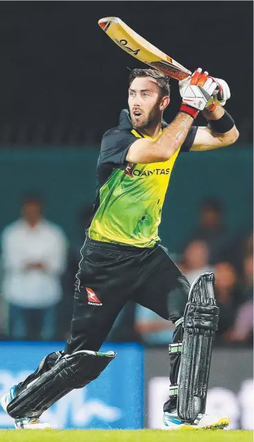  ??  ?? DEFYING CRITICS: Glenn Maxwell on fire during the Twenty20 Internatio­nal match between Australia and England in Hobart. Picture: GETTY IMAGES