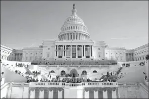  ?? AP/PATRICK SEMANSKY ?? The U.S. Capitol looms over a stage Sunday in Washington during a rehearsal of President-elect Donald Trump’s swearing-in ceremony.