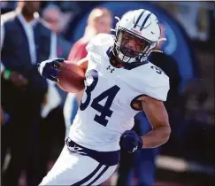  ?? Yale Athletics ?? Yale freshman running back Joshua Pitsenberg­er is third on the team with 65 rushing yards per game, behind Tre Peterson and Nolan Grooms, which is also fourth in the Ivy League.