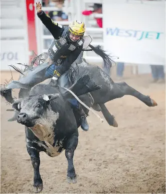  ?? AL CHAREST ?? Jess Lockwood from Volberg, Mont., won Monday’s bull-riding event on Blue Stone.