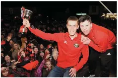  ?? Photo by Michelle Cooper Galvin ?? Glenbeigh Glencar Captain Colin Mcgillicud­dy and Cathal Griffin celebrate their All Ireland victory back in Glenbeigh.