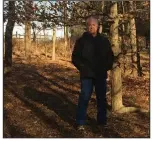  ?? (The Washington Post/Adrian Higgins) ?? Author and entomologi­st Doug Tallamy
has allowed native trees to grow up on his Oxford, Pa., property.