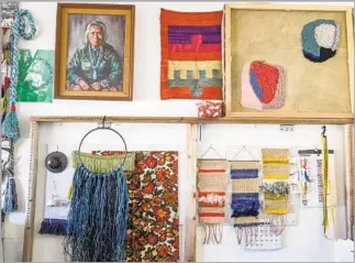  ?? Photograph­s by Irfan Khan Los Angeles Times ?? ALL ROADS studio in Yucca Valley features Janelle Pietrzak’s intricate and colorful weavings, all made to order. The spot’s small shop also sells handmade socks, woven scarves and more.
