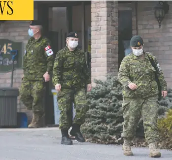  ?? GRAHAM HUGHES / THE CANADIAN PRESS ?? Canadian Forces members help out at Villa Val des Arbres, a long-term care home in Laval, Que., on April 19.
More than 1,000 military members are now helping the province with its COVID-19 response.