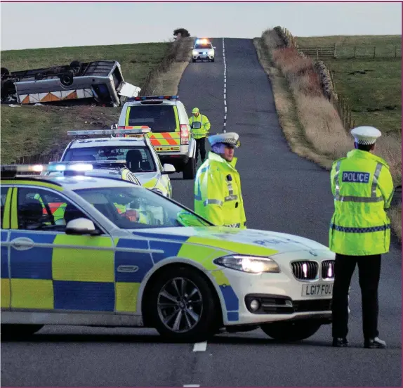  ??  ?? The accident in the Borders was being treated as a major incident. A total of 23 passengers and the driver were taken to hospital Photograph: Alan Simpson