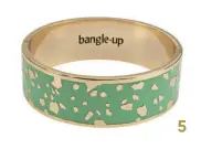  ?? ?? 5. Bracelet BANGLE UP, laiton trempé dans un bain d’or, 90 €, Exclusivit­é Printemps.