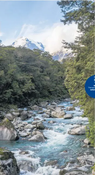  ?? Picture / Mike Scott The tourism squeeze ?? Mt Tutoko stands above the Tutoko River in the Cleddau Valley, near Milford Sound. Watch nzherald. co. nz