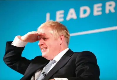  ??  ?? Not backing down: Boris Johnson speaking at Bournemout­h Pavilion Theatre during a Tory leadership hustings