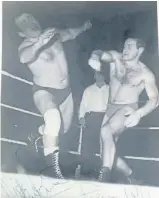  ??  ?? The photograph on the right was supplied by Jim Imrie, of Perth, who says: “The picture was taken in the 1950s when wrestling took place regularly at Perth City Hall.
“The fight was between George Kidd and the infamous Mick Mcmanus, who featured in...