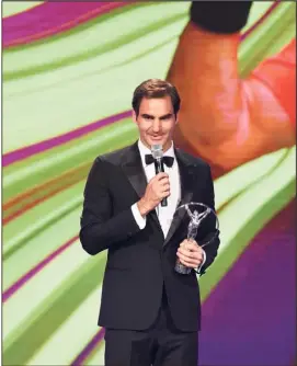  ?? (Photo Getty Images) ?? Federer continue à jouer les gros bras...