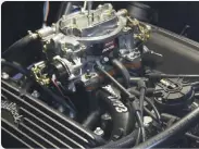  ??  ?? 03
First step was to turn the engine to 12 degrees before top dead center and then remove the air cleaner, the distributo­r cap, followed by the distributo­r, and the disconnect­ing of the hoses and throttle linkage.