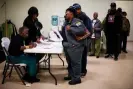  ?? Jim Watson/AFP via Getty Images ?? Voters in Montgomery in 2017. Photograph: