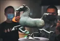  ?? Galloping Horse Treading on a Flying Swallow on display YANG YANMIN / CHINA NEWS SERVICE ?? The sculpture at the Gansu Provincial Museum in June.