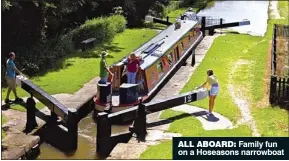  ??  ?? ALL ABOARD: Family fun on a Hoseasons narrowboat