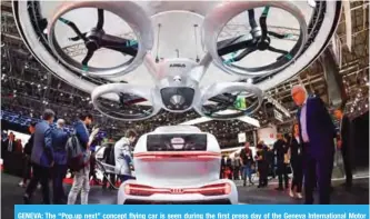  ??  ?? GENEVA: The “Pop.up next” concept flying car is seen during the first press day of the Geneva Internatio­nal Motor Show on Tuesday.— AFP