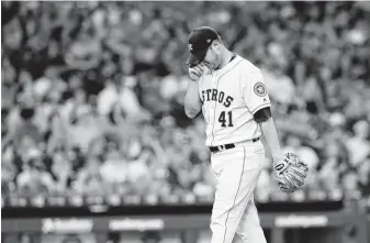  ?? Tim Warner / Getty Images ?? Astros righthande­r Brad Peacock walks off the mound in the third inning of Thursday’s game against the Pirates. He was put on the 10-day injured list Friday.