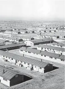  ?? Western History/Genealogy Department Courtesy of Denver Public Library ?? Prefabicat­ed barracks are shown in December 1942 at Camp Amache, which is west of Granada.