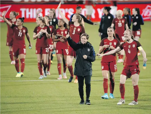  ?? — THE ASSOCIATED PRESS FILES ?? The U.S. women’s national soccer team, shown here leaving the field after a win over Russia in an internatio­nal friendly soccer match in Frisco, Tex., last Thursday, has struck a deal giving players better compensati­on from their federation.