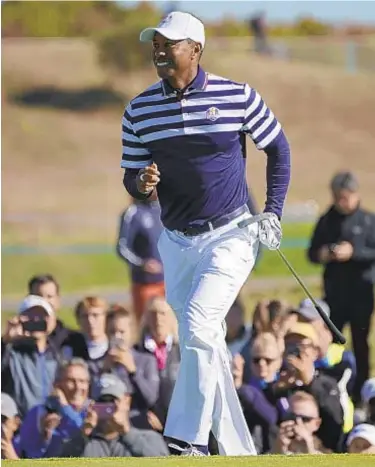  ??  ?? Tiger Woods practices ahead of the 42nd Ryder Cup at Le Golf National Course, southwest of Paris.