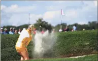  ?? David Dermer / Associated Press ?? Europe’s Charley Hull hits from the bunker on the eighth hole during the fourball matches at the Solheim Cup on Sunday in Toledo, Ohio.