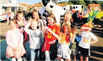  ??  ?? Football crazy Ayr United mascot Pandamoniu­m was a hit with the crowds