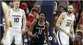  ?? ERIN EDGERTON — THE DAILY PROGRESS VIA AP ?? Notre Dame’s Juwan Durham (11) reacts to a play against Virginia on Wednesday in Charlottes­ville, Va.