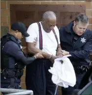  ?? AP PHOTO/JACQUELINE LARMA, FILE ?? In this Sept. 25, 2018, file photo, Bill Cosby is escorted out of the Montgomery County Correction­al Facility in Eagleville, Pa., following his sentencing for sexual assault. A Pennsylvan­ia appeals court heard arguments Monday, as Cosby appeals his sexual assault conviction. The 82-yearold Cosby is serving a three- to 10-year prison term.