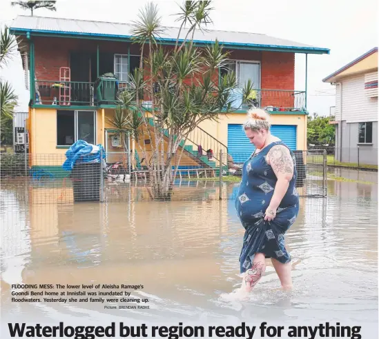  ?? Picture: BRENDAN RADKE ?? FLOODING MESS: The lower level of Aleisha Ramage’s Goondi Bend home at Innisfail was inundated by floodwater­s. Yesterday she and family were cleaning up.
